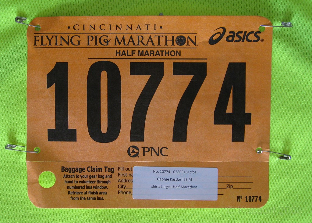 Flying Pig 2009 0191.jpg - The official bib pinned to the lime green running shirt.
